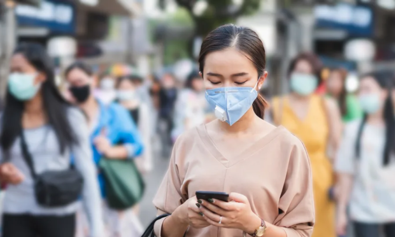 woman using smartphone